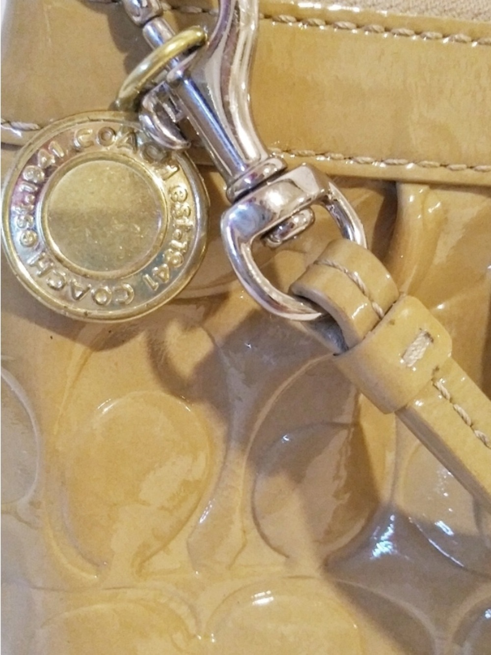 Nude Coach Patent Leather Wristlet Tan